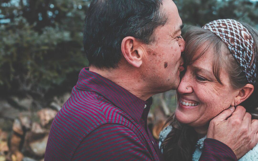 Older couple showing affection.