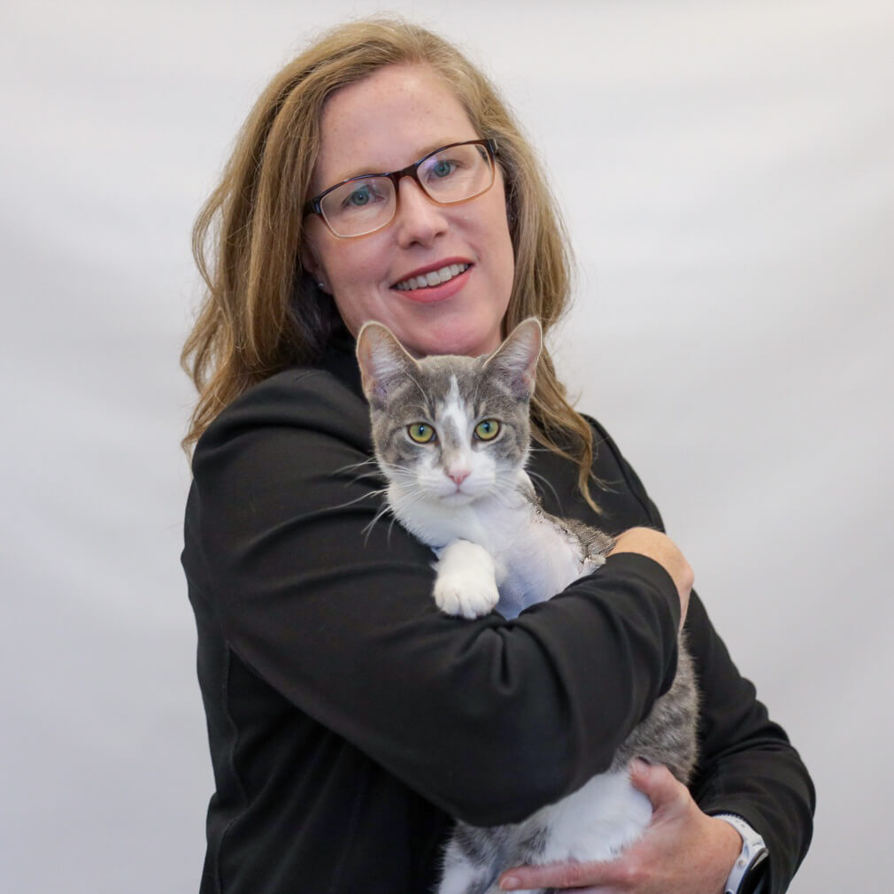 CFO Angella Durkin holding a cat